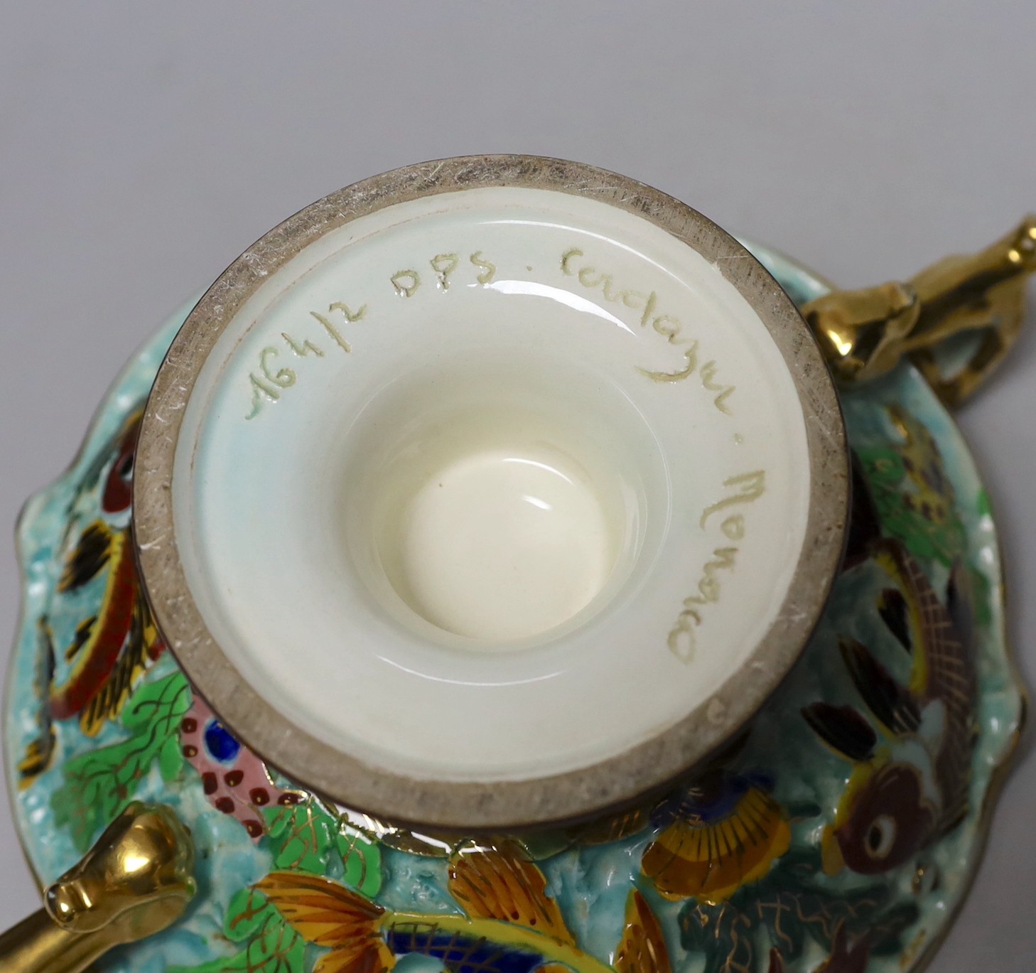 A French tazza with two handles, vibrant colours 30cm wide